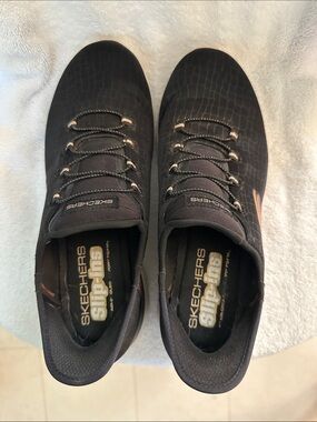 Skechers Women’s Black Slip-Ins with Subtle Rose Accents